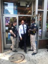 <b>Sheriff Anthony Miranda steps out of the New City Smoke Shop, an illegal cannabis store in downtown Manhattan which was padlocked on May 7 after a raid by a joint task that included the sheriff’s office, the NYPD and the Department of Consumer and Worker Protection.</b> Photo: Keith J. Kelly