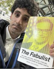 Author Mark Chiusano with his just released book “<i>The Fabulist: The Lying, Hustling, Grifting, Stealing, and Very American Legend of George Santos </i> from Atria/One Singal Publishers, an imprint of Simon &amp; Schuster.