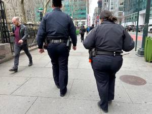 Two cops on patrol in mid-town Manhattan. Photo: Ken Frydman