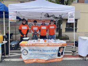 Volunteers for Assembly member Rebecca Seawright set up a community outreach booth at the Second Ave. Street Fair on May 4th. Photo: Twitter