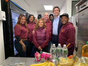 Council Member Ben Kallos, second from right, with Victor Rivera, right, and other BHPN staffers at the opening of the UES soup kitchen.