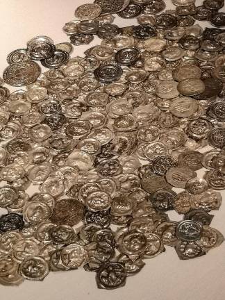 The Colmar Treasure's 300 silver coins, along with one gold florin, perhaps intended to pay a special tax on Colmar's Jewish citizens, was found in 1863 when workers were renovating a confectioner's shop.