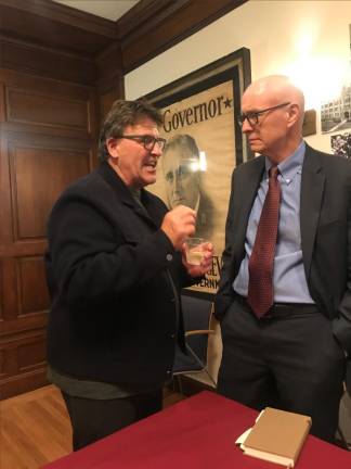 Kevin Breslin (left), the son of legendary columnist Jimmy Breslin, chats with <i>NY Times</i> columnist Dan Barry, who compiled the anthology, <i>“Breslin: Essential Writing.” </i>The talk Barry gave with veteran city reporter Michael Daly was part of the Jack Newfield lecture series recently at the Public Policy Institute of Hunter College. Photo: Marie Pohl