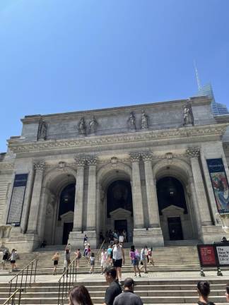 The exterior of the NYPL’s Stephen A. Schwarzman Building on July 6th, soon after the library was temporarily evacuated when the NYPD investigated a suspicious package near a burning trash can.