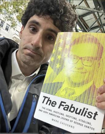 Author Mark Chiusano with his just released book “<i>The Fabulist: The Lying, Hustling, Grifting, Stealing, and Very American Legend of George Santos </i> from Atria/One Singal Publishers, an imprint of Simon &amp; Schuster.