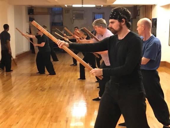 Students practicing Tai Chi in the Times Square studio CK Chu Tai Chi that is now celebrating its 50th anniversary. Carol Chu, now 82, took over the school when her husband and company founder CK Chu passed in 2013. Photo: Carol A. Chu