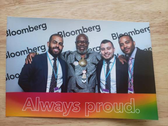 Brown (second from left) at Bloomberg headquarters in 2019 for an event marking the 50th anniversary of Pride, included in the Stonewall 50 time capsule. Photo courtesy of Reginald Brown