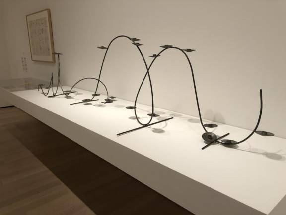 Alexander Calder’s “Candelabra,” 1939. Rolled steel and sheet-metal candle holders, two of ten sections. Commissioned by The Museum of Modern Art, New York, for its 10th Anniversary Dinner, May 8, 1939. Photo: Val Castronovo