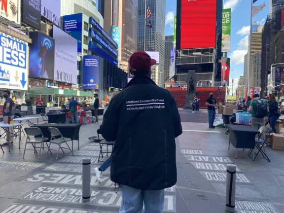 Community navigators setting up in Times Square. Photo: Center for Court Innovation