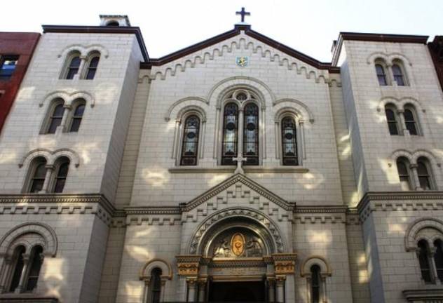The exterior of Most Precious Blood Church on Baxter St. in Little Italy. The parish was merged with the Basilica of Old St. Patrick Cathedral nearly ten years ago but on Jan. 1, Cardinal Timothy Dolan rescinded the merger. Photo: Most Precious Blood Church.