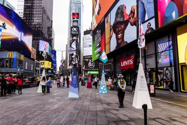 “How I Keep Looking Up” flags in Times Square. Photo: Maria Baranova