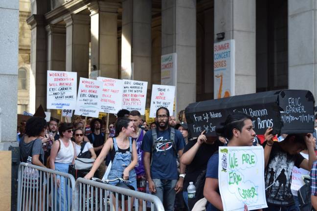 Protestors march in downtown New York five years after Eric Garner's death at the hands of the NYPD.
