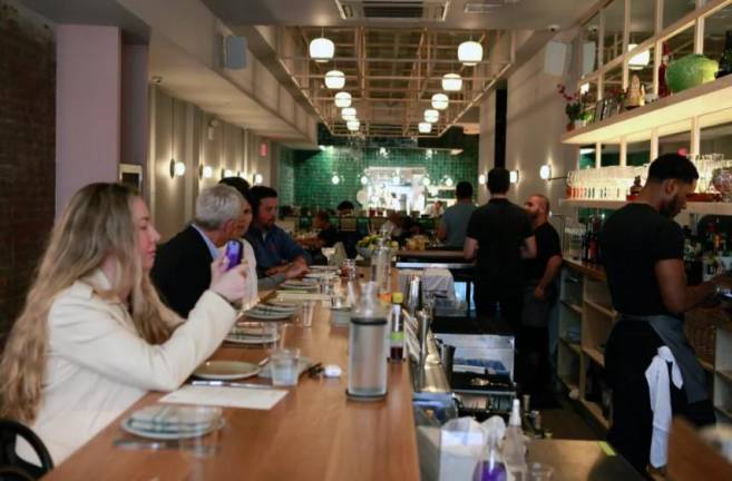 People dine at Lola’s in Manhattan’s NoMad district, April 30, 2024.