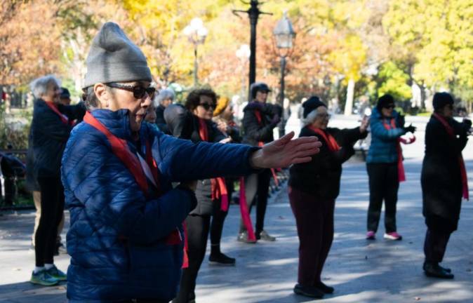 Each week a dedicated group of seniors gather for dance outdoors in Washington Sq. Park. Photo: Mimi Lamarre