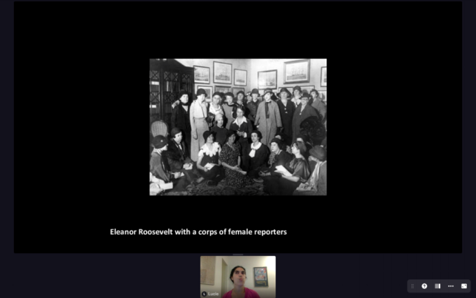 Historian Lucie Levine presents a photo of Eleanor Roosevelt at an all-female press conference.
