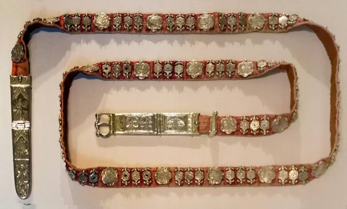 This Italian belt c. 1350 from the Met's collection, with carved silver decorations, was typical of the era. A similar one was discovered in the Colmar Treasure.