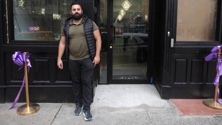 Joseph Abramov in front of his cannabis dispensary, Urban Leaf, at 977 2nd Ave.