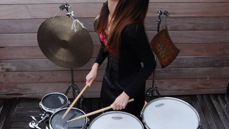 Lisa Pegher got her first drum set when she was seven and a teacher recognized her talent and paid for the drum set as well as a year of lessons.