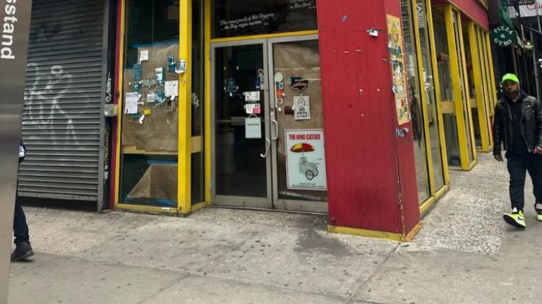 The exterior of the beleaguered Papaya King, an iconic hot dog stand that stood for decades on the corner of E. 86th St. &amp; 3rd Ave. ZD Realty, the developer which now owns the plot, has filed permits to build a 17-story luxury condo building on the site.