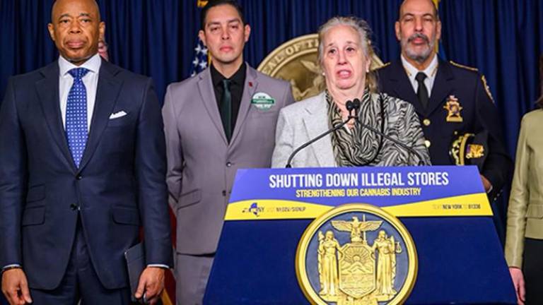 UWS City Council member Gale Brewer (at mic) was invited by Governor Kathy Hochul (far right) to join NYC Mayor Eric Adams (left) and NYC Sheriff Anthony Miranda (rear) and other officials announcing new law designed to curb illegal weed shops. Photo: Office of City Council member Gale Brewer