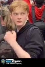 The NYPD asked the public to help search for this male suspect back in April. Zuhdi Ahmed, a 20-year-old red head turned himself in on Thursday and is facing charges for connections to a hate crime on a Columbia student.