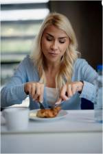A croissant, a bottle of water and a cup of coffee is a less than ideal breakfast for recharging your body.