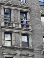 Brian Stokes Mitchell singing from his apartment.