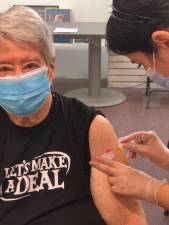 Civic activist Helene Goldfarb receiving a shot. Photo courtesy of Office of Assembly Member Rebecca Seawright