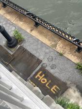 A supposed “hole” in the long-shuttered stretch of the East River Esplanade, around East 70th Street. It could be part of a sinkhole, which is reportedly present in the area—and which could present yet another hurdle in reopening the walkway.