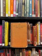 The stacks at New York Society Library, including Cervantes.