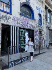 Lori Zimmer in front of Jean-Michel Basquiat’s studio, 57 Great Jones Street. Photo by Ryan Thomann 2020
