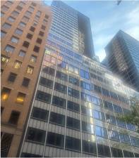 The E. 43rd St. rear of the former Pfizer HQ. The buckled beams of the building at 235 E. 42nd St. were in the northwest corner of the building, which caused nearby buildings to be vacated and roads closed until July 24. The cause of the near catastrophe remains under investigation.