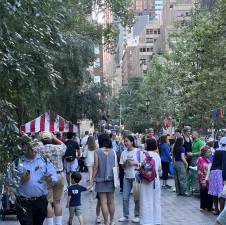 The annual National Night Out event for the NYPD’s 17th Precinct was held at Dag Hammarskjöld Plaza on August 4, drawing a crowd of local residents looking for grilled food and company.