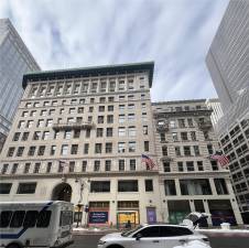 The former Lord and Taylor Building (left) has been used by Amazon as a major office space since 2023. During their renovation of the space, Amazon cleaned up toxic chlorine compounds from soil on the lot.