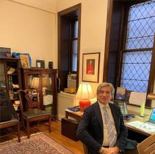 Gianni Perilli in his church office. Photo: Michele Willens