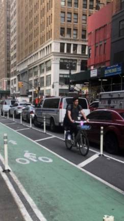Bikers frequently go the wrong way down bike lanes and one-way streets. The writer was hit from behind by a wrong-way biker on Sixth Avenue recently. Cops would not take down an incident report, she said.
