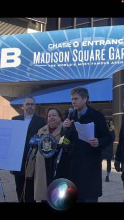 NYS Senator Brad Hoylman (at mic) was joined by State Senator Liz Krueger (center) and activist Albert Fox Kahn (far left)and other politicians in calling for a halt to Madison Square Garden’s use of facial recognition technology to bar attorneys with law suits against MSG from entering its properties. MSG said pending lawsuits create an “adversarial environment” and all attorneys at firms involved in suits are told they are not welcomed. Photo: Keith J. Kelly