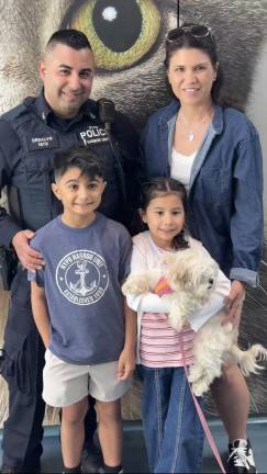 Hudson, a 2-year-old Maltese who was rescued from the East River by the NYPD Harbor Unit, was adopted by the DeSalvo family—Jared DeSalvo, his wife Nicole, and their two children, Salvatore and Stella. NYPD Officer DeSalvo was one of the cops who rescued Hudson on March 30.