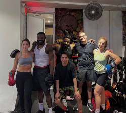 Hudson Boxing studio with Richard Andre (center). He says his 18-year-old business, which is fully licensed, was targeted by someone interested in provoking incidents and stirring unrest among vendors on Canal Street.