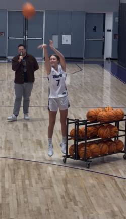 Airborne: Aizlyn Albanese, a new addition to the NYU Violets (defending Division III national champs) women’s basketball team, pictured during a three-point contest at an Oct. 17 pep rally.