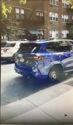 Another tire-theft victim, near 88th and York.