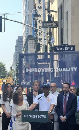 Mayor Eric Adams (center) helming an Aug. 8 press conference–at W. 35th &amp; 8th–on the effects of scaffolding on businesses. Pictured to his immediate left: Deputy Mayor Meera Joshi, immediate right: City Council Member Keith Powers, behind &amp; right: DOB Commish Jimmy Oddo.