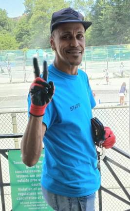Angel Otero, a tireless staffer at the Central Park Tennis Courts, helps to keep things running smoothly.