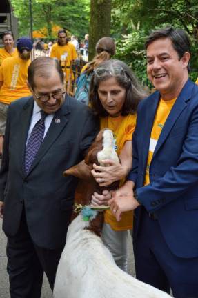Congressman Jerrold Nadler (left), Council Member Helen Rosenthal (center) and Riverside Park Conservancy President and CEO Dan Garodnick (right) posed with one of the goats. Photo: Abigail Gruskin