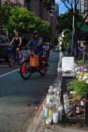 Bikers rushed past in the abutting Second Avenue lane. Photo: Abigail Gruskin