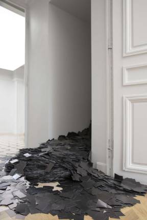 Heman Chong, Monument to the people we've conveniently forgotten (I hate you), 2008, offset prints on 300 gsm paper, approximately 1 million copies, each measuring 2.2 x 3.55 inches. Courtesy of the artist and Wilkinson Gallery