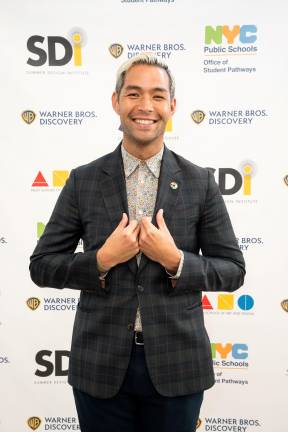 Principal Max strikes a pose. His energy and effervescence are completely unfeigned.