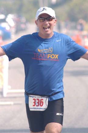 Bret Parker during the run portion of a triathlon in 2014. Courtesy of Bret Parker