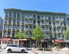 A developer is looking to knock down a row of buildings on First Ave. &amp; E. 60th St. (pictured above in 2022), in order to build a 395-ft. tall tower in their stead.