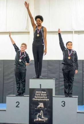 An Asphalt Green boys gymnastics team at the New York state championships earlier this year.